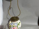 a lamp that is sitting on a table next to other items