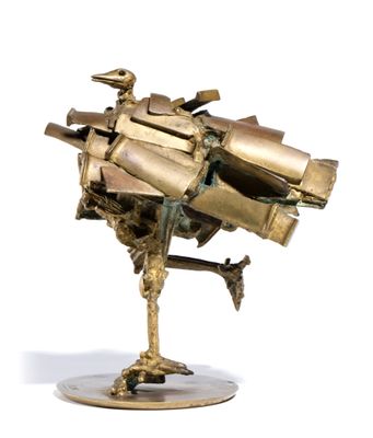 a bronze sculpture of a bird on a stand