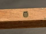 a piece of wood that has a hole in it