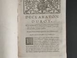 an open book with a picture of a lion on it