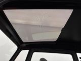 a view of the inside of a vehicle ' s sunroof