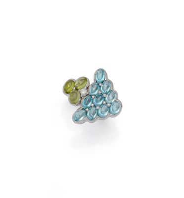 a close up of a ring with a flower design on it