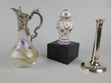 three vases that are sitting next to each other on a table