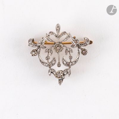 une image représentant une broche en forme de diamant sur fond blanc