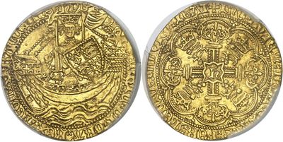 a gold coin with an image of a ship on it