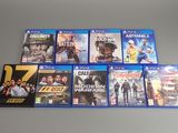 a bunch of video games sitting on top of a table