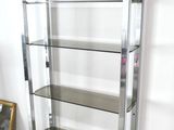 a glass display case in the corner of a room
