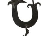 an image of a metal sculpture of a bird