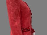 red jacket with sequins on the shoulders and cuffs