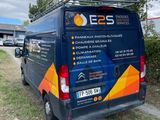 an image of a van parked on the side of the road