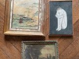 three paintings on the floor next to each other