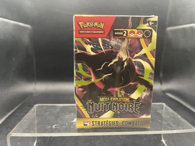 un gros plan sur une boîte du jeu de cartes à collectionner Pokémon