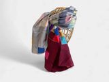 an image of a chair with a blanket on top of it
