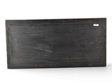 a black board with a white label on it
