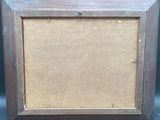 a close up of a picture of a picture frame on a table