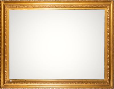a gold framed mirror on a white background
