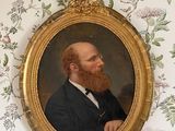 un tableau représentant un homme barbu dans un cadre en or