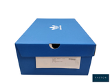 a blue box with a white logo on it