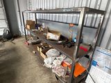 a metal shelving with a lot of items on it