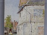 une photo d'un tableau représentant un bâtiment accroché au mur