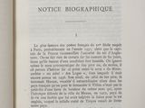 an open book with a black and white image of a dog