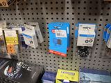 many different types of electronics on display in a store