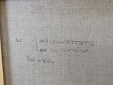 un gros plan sur la photo d'un morceau de tissu sur lequel figure une inscription