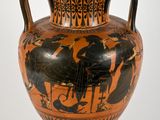 a black and orange vase with a painting on it