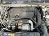 a picture of a car engine with its hood open