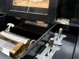 a music box that is sitting on top of a piano