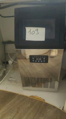 a picture of a small ice cream machine on a counter