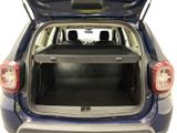 the back end of a blue car with the trunk open