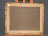 an old wooden easel with a painting on top of it