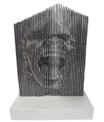 an image of a sculpture of a man ' s face made out of metal strips