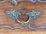 a close up of a drawer with a handle on it