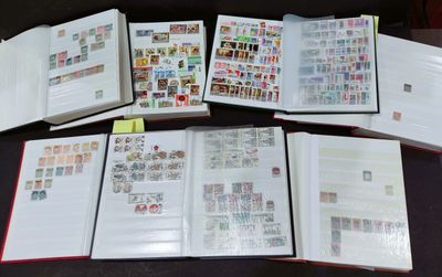 a lot of stamps on the pages of a book
