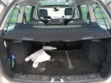 a trunk of a car with the back seats folded down