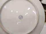 a white plate with a blue and white design on it