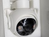 a white box with a camera inside of it