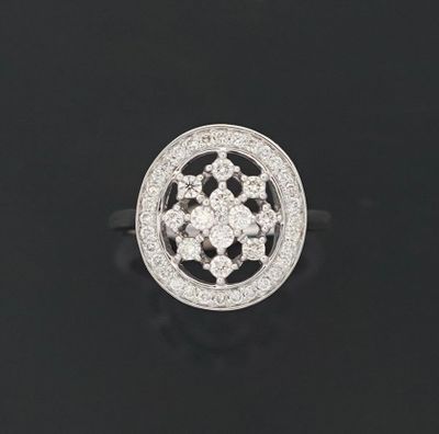 Bague ronde en or blanc 18k 750 millièmes ornée de diamants …