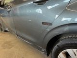 a close up of a car that has a denting on it