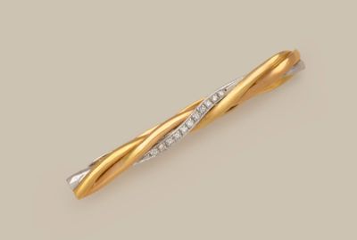 a gold and diamond bar brooch