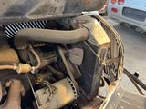 an old car with a radiator and a radiator on the hood