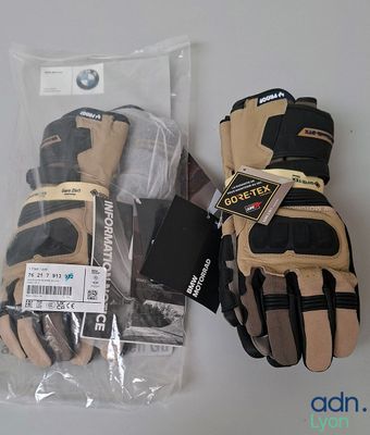 a pair of gloves and a pair of gloves on a table