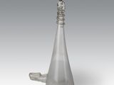 an image of a silver vase with a bird on top of it