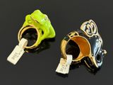 pair of gold and enamel rings with a green frog and a yellow frog