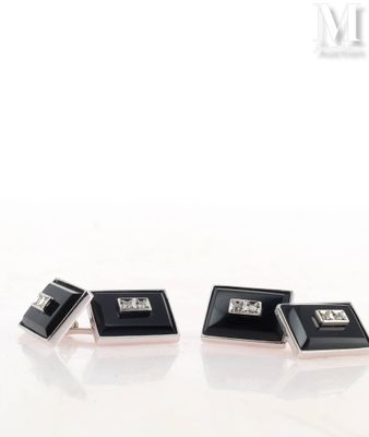 black onyx cufflinks with diamonds on a white background