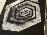 a black and white picture of a book with a picture of an eye on it