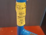 a blue pipe with a yellow sticker on it that says don ' t just
