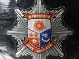 a close up of a badge on the back of a bag